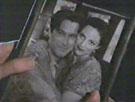 Monroe shows Charlie the picture of Constance and her husband.